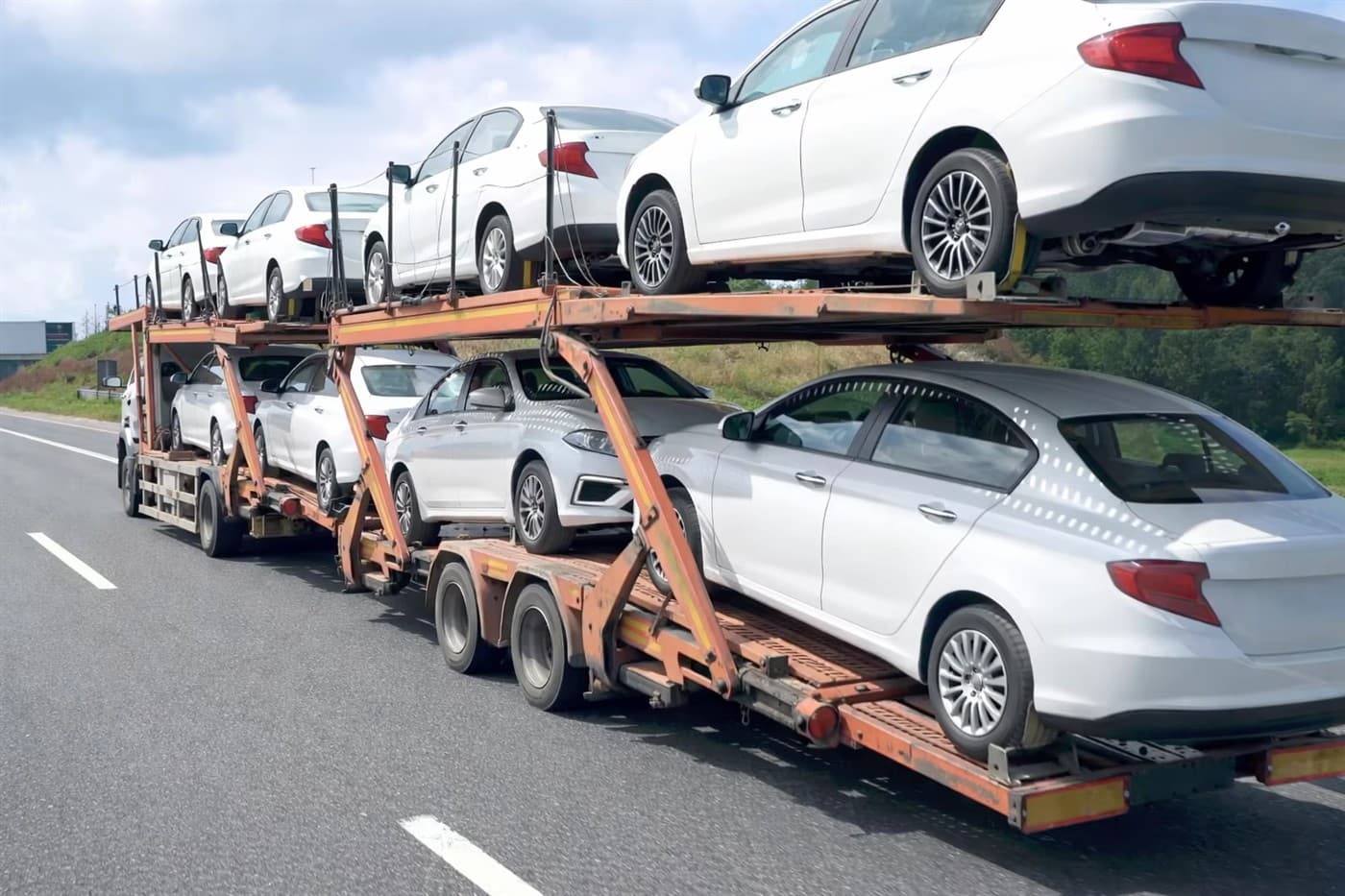 Car carrier transporting vehicles on a highway