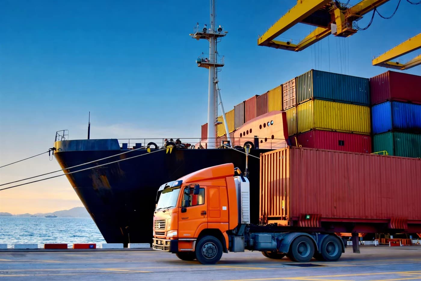 Container ship and truck at a port
